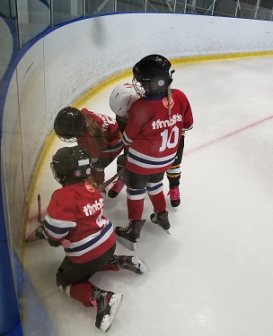 Tykes_Puck_against_the_Boards_2019-20.jpg